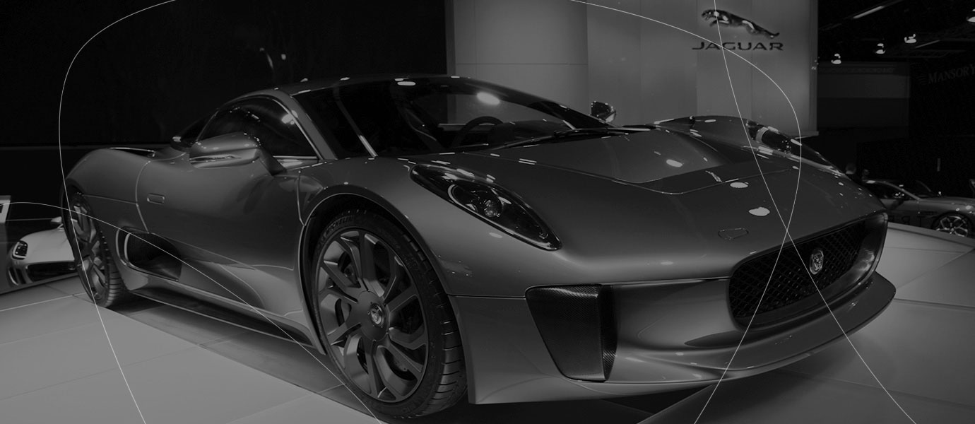 Shiny new Jaguar sports car in the retail showroom